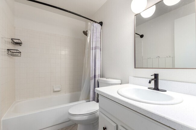 Building Photo - Light & Bright Retreat with Modern Touches!