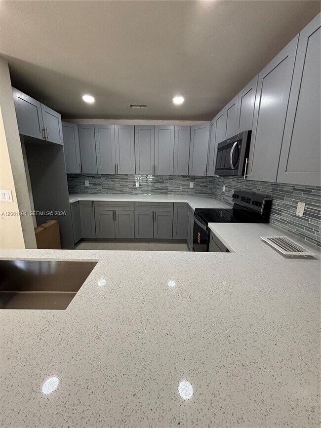 Building Photo - 5450 NW 94th Terrace
