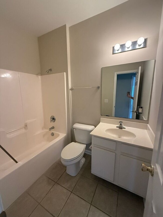 Building Photo - RENT SPECIAL! Freshly Painted! New Carpet!...