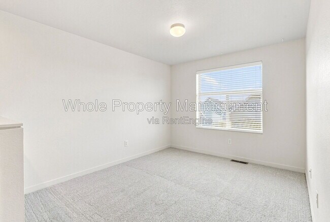 Building Photo - 9004 E 49th Pl