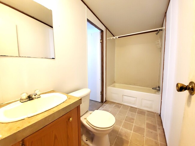 Building Photo - Spacious 4 bedroom with 3 FULL bathrooms nestled on 2 acres! MUST SEE!!!