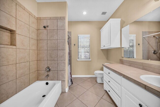 Building Photo - Live just steps from Lake Conroe in this beautifully maintained 3-bedroom, 2-bath home located in...