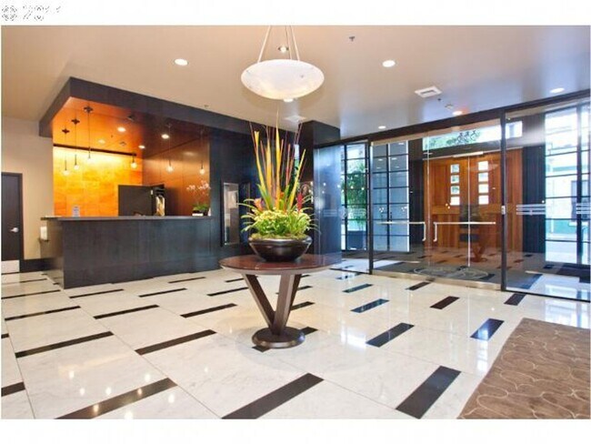 Building Photo - Elizabeth Lofts - 7th floor west facing Pearl District studio w/parking/concierge/most utilities