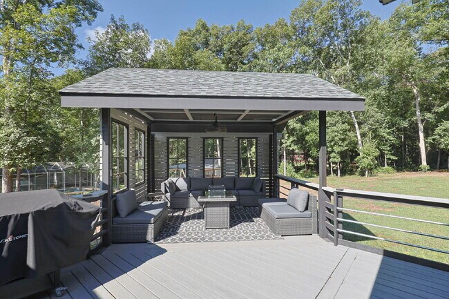 Building Photo - COMING SOON · Designer Renovation · Covered Deck Pavilion · 2-Car Garage · Lawn Care Included