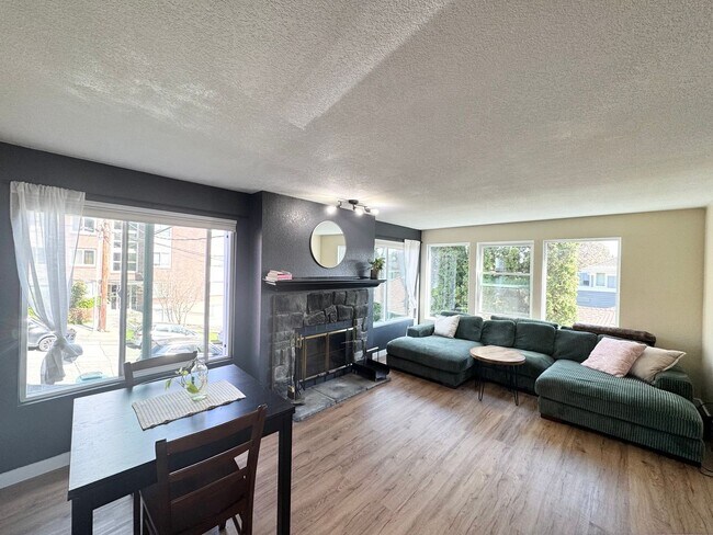 Building Photo - Updated, light flooded corner 1 bedroom 1 bath condo in Madison Valley