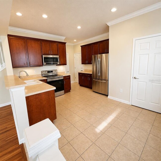 Building Photo - 10222 Pink Palmata Ct