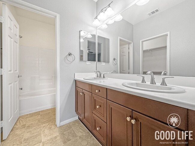 Building Photo - Elegant 3BR Residence in Exclusive Gated Community w/ AC & Garage!