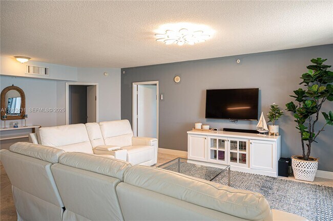 Building Photo - 16699 Collins Ave