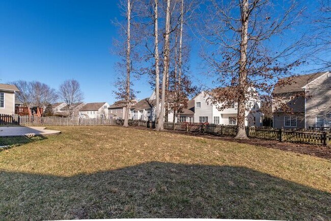 Building Photo - Spacious 5 Bedroom Home with 3rd Floor Suite, Fenced Yard & Community Amenities – $3,500/mo