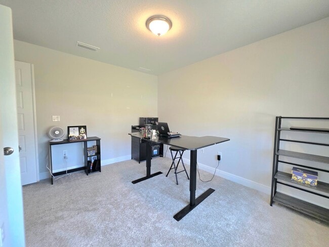 Building Photo - Spacious 4BR Home Near Navy Federal & UWF ...