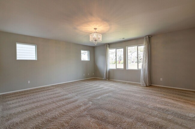 Building Photo - 4 Bedroom Home with Open Den, Living & Family Rooms – Space for Everyone