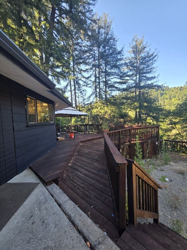 Building Photo - Breathtaking Home offers flexible living with bonus rooms ideal for an office, art studio, gym, o...
