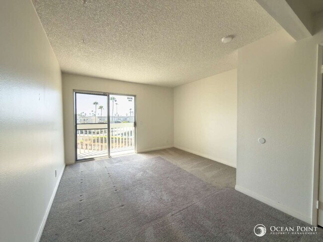 Building Photo - Charming 2 Bedroom Anacapa Condo just steps from the beach in Port Hueneme!