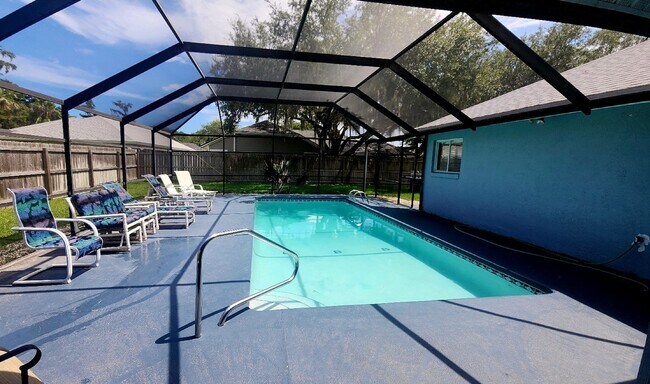 Building Photo - The Woodlands of Palm Coast- FURNISHED- 4 Bedroom 2 Bath- Long Term