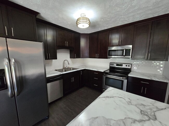 Building Photo - 6911 Wickersham Rd