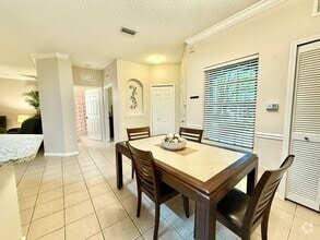 Building Photo - Turnkey and Move-in ready! Fully Furnished...