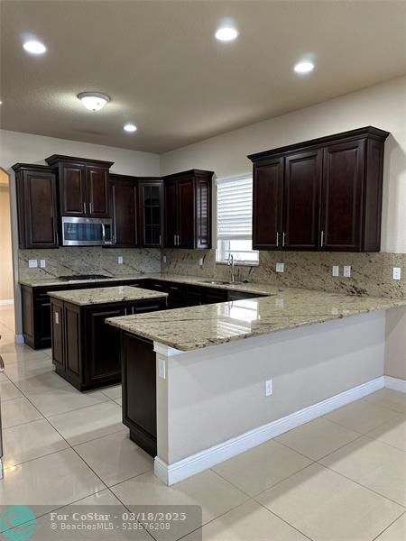Building Photo - 9751 Blue Isle Bay