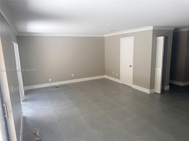 Building Photo - 10787 Royal Palm Blvd