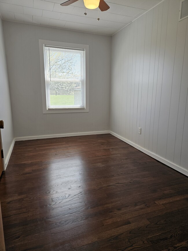Building Photo - 1217 W 63rd Ave