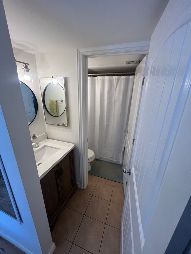 Building Photo - Coming Soon May 2026 | Bright 2BR Condo with Covered Parking