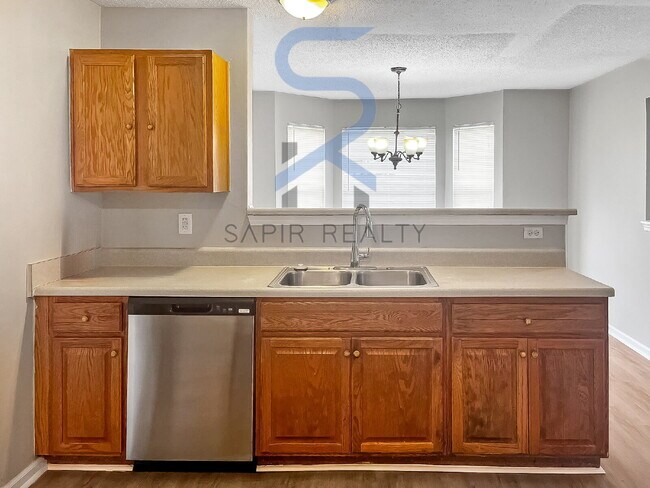 Building Photo - Move in before October 15th and choose you...