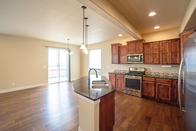 Building Photo - Bright & Spacious 3 Bed + Loft | 3-Car Garage in North Fort Collins