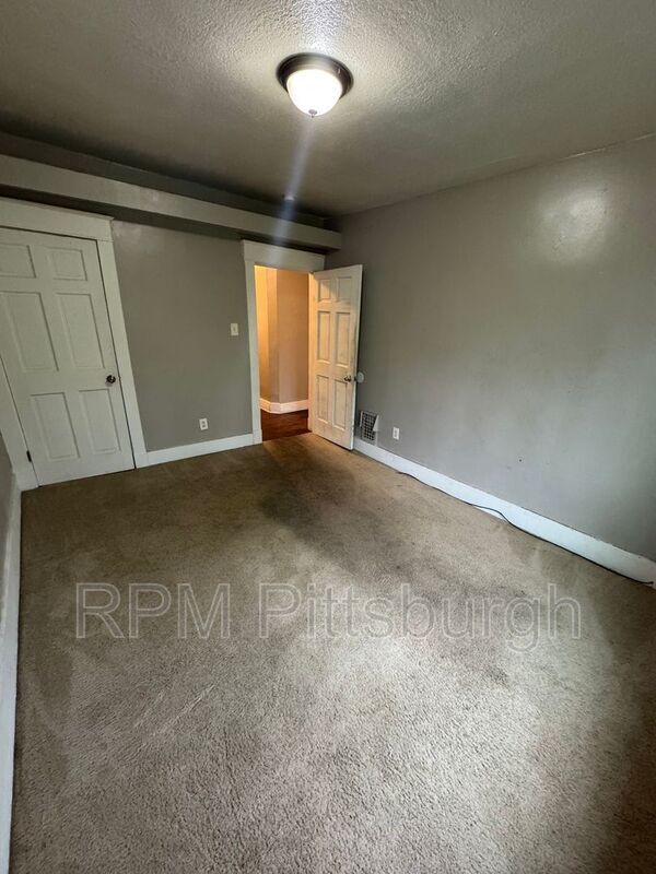 Building Photo - 311-313 W Burgess St
