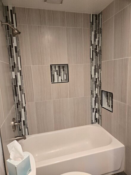 Upstairs Bath_Tile tub/shower w_storage - 8731 Field Way