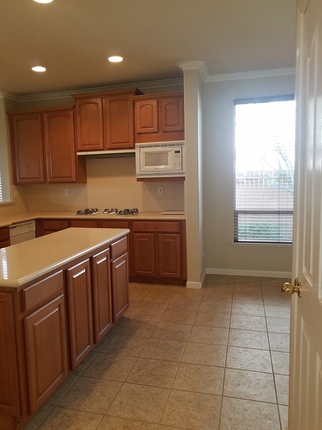 Building Photo - Action Properties R.E.S. Inc. Offering Beautiful Highland Park Single Story 3 Car, 4 Bedroom, Gar...