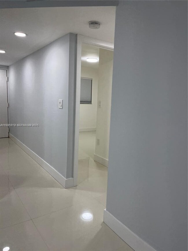 Building Photo - 9917 W Okeechobee Rd