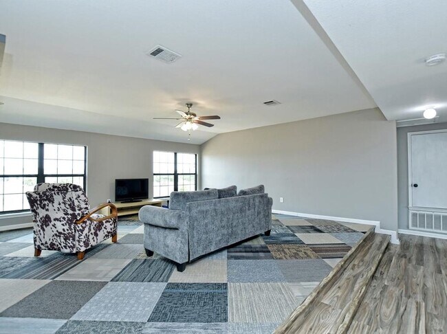 upstairs living area - 102 N Prairie Ln