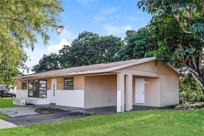 Building Photo - 5801 Royal Palm Blvd