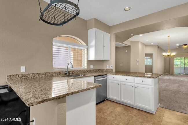 Building Photo - Welcome to this stunning 3-bedroom, 2-bath condo in the heart of McCormick Ranch!