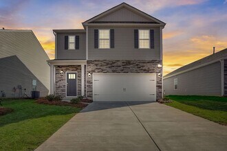 Building Photo - Modern 5-Bedroom Home Near Troutman – Show...