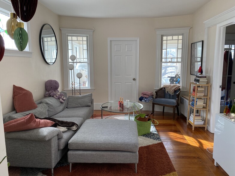 living room to the enclosed front porch - 81 Pearson Rd