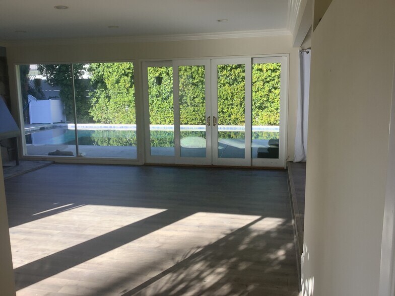 NEW living room flooring - 15707 Varden St