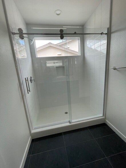 Primary shower with slider doors - 13914 Boyden Way