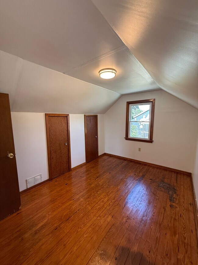 Building Photo - Charming 4-Bedroom Cape Cod Home with Spacious Yard & Storage