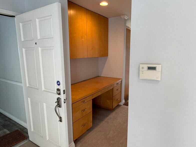 View from entry/living room into hallway with built in desk - 1649 Appian Way