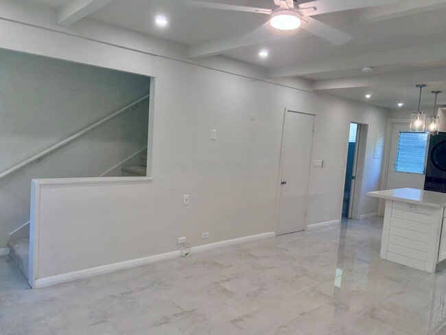 Building Photo - Available Now | 2 Bedroom, 2 Bathroom Townhouse with 1 Assigned Parking Stall at Tropic Gardens 1