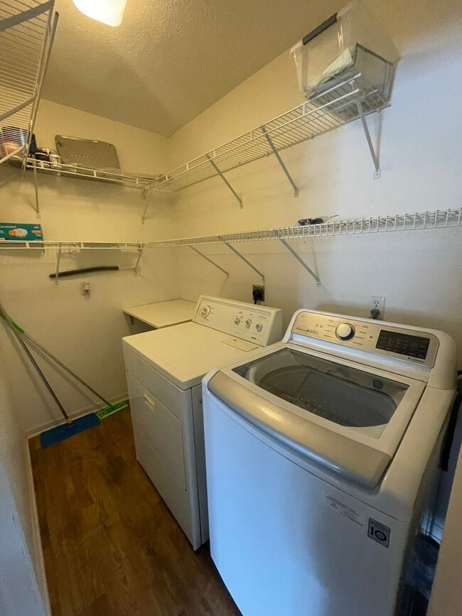 Building Photo - 2 Bed + Office Condo | Pool, Garage & Flexible Move-In