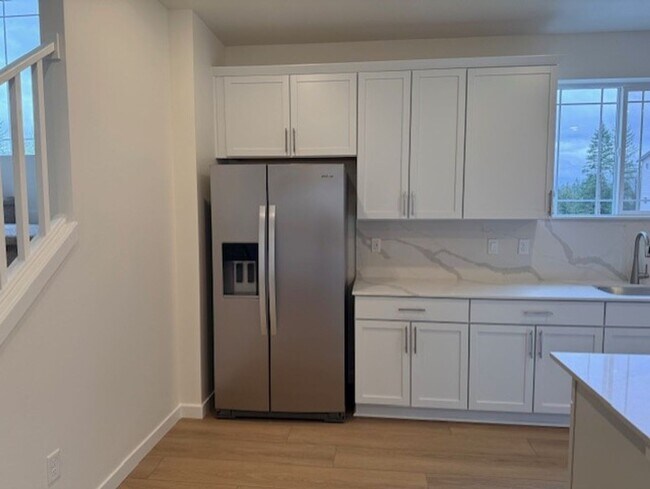 Building Photo - Elegant 4-Bed, 4-Bath 3-Story Home with Gourmet Kitchen & Private Backyard