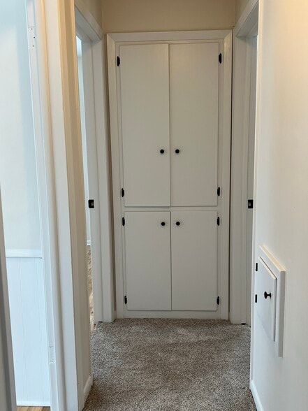 End of hallway linen cabinets - 835 Maple St NE