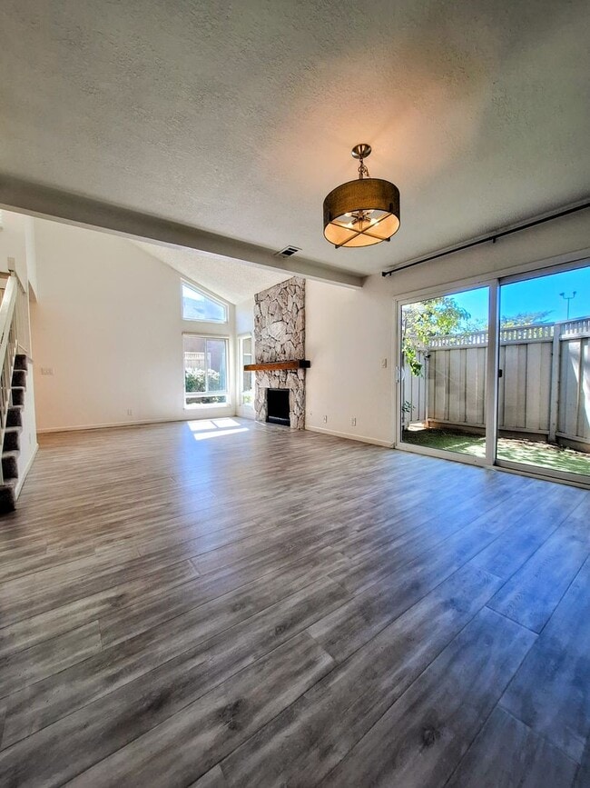 Building Photo - Spacious Two-Story 3bd Townhouse With Private Patios, Balcony, & Garage