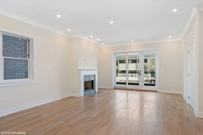 Building Photo - Condo Quality 3,400 SF Duplex Down in Roscoe Village, Pet Friendly Available August 1st