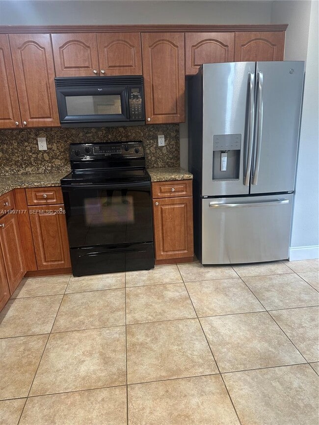 Building Photo - 9724 SW 142nd Pl