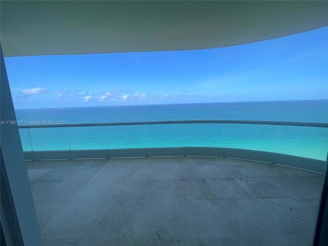 Building Photo - 16047 Collins Ave