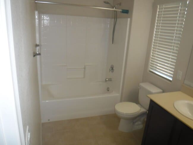 Building Photo - SPACIOUS 4 BEDROOM HOME WITH 2.5 BATHS, 2 ...