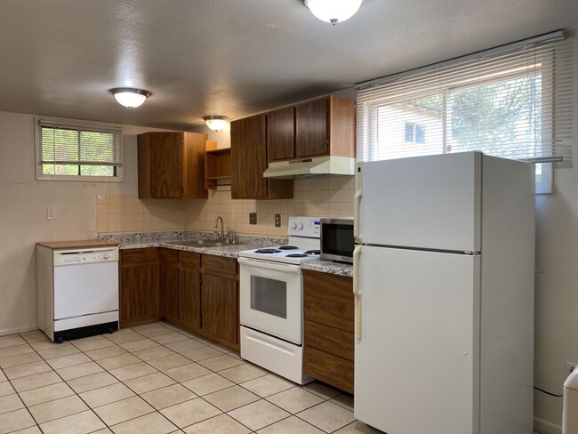Building Photo - STUDENTS WELCOME! Ranch Home w/ Finished Basement, Fenced Yard and Two Kitchens