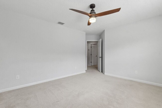 Building Photo - Spacious 4-Bedroom Home in Amelia Walk wit...